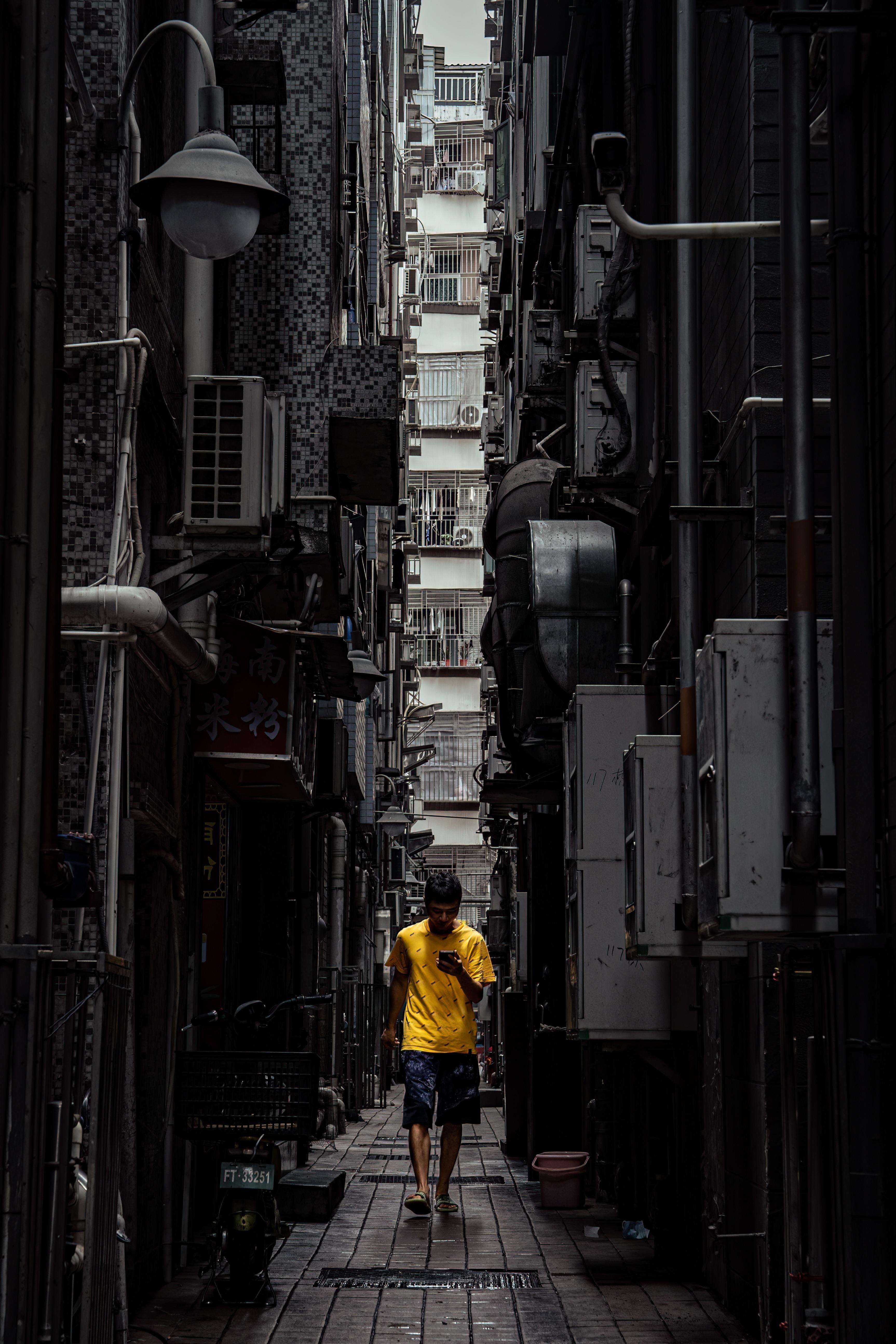 image showing ITAP of a man in overwhelming urban density