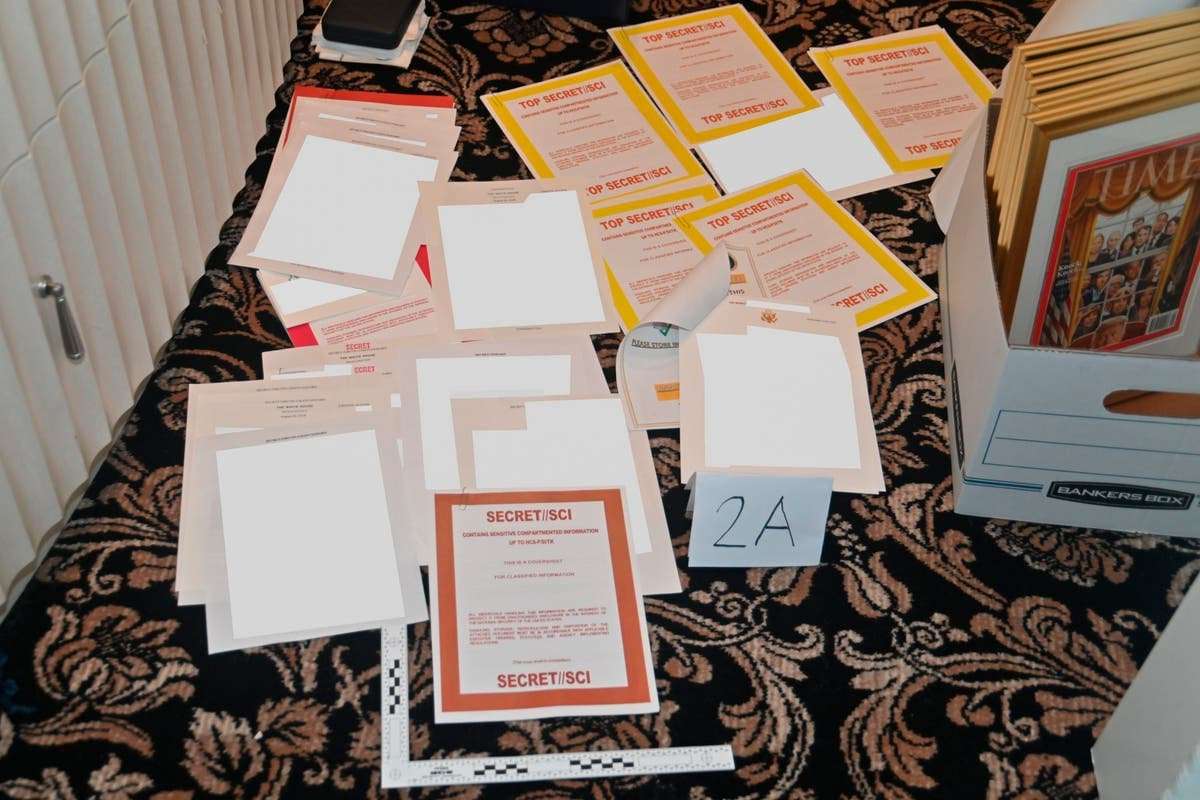 image for Trump caught on tape discussing classified documents he kept after leaving White House, reports say