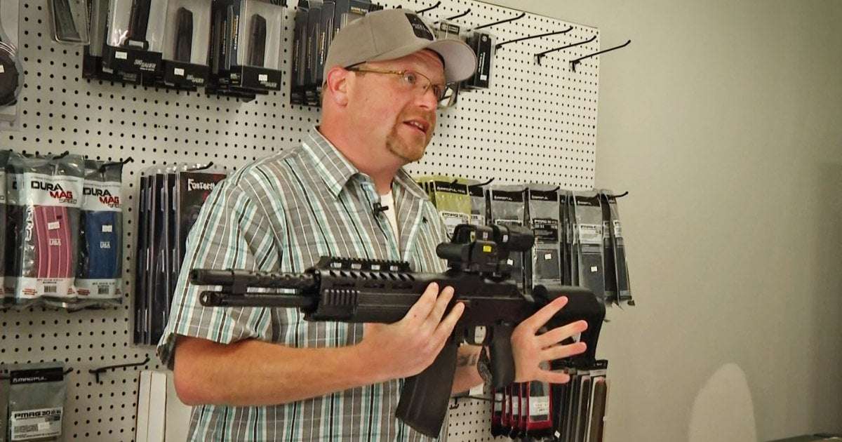 image for Georgia gun shop owner shutters store after mass shootings targeting children