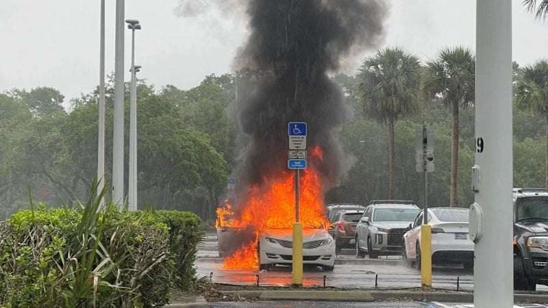 image for A Florida woman's car caught fire with her children inside while she allegedly shoplifted inside a mall