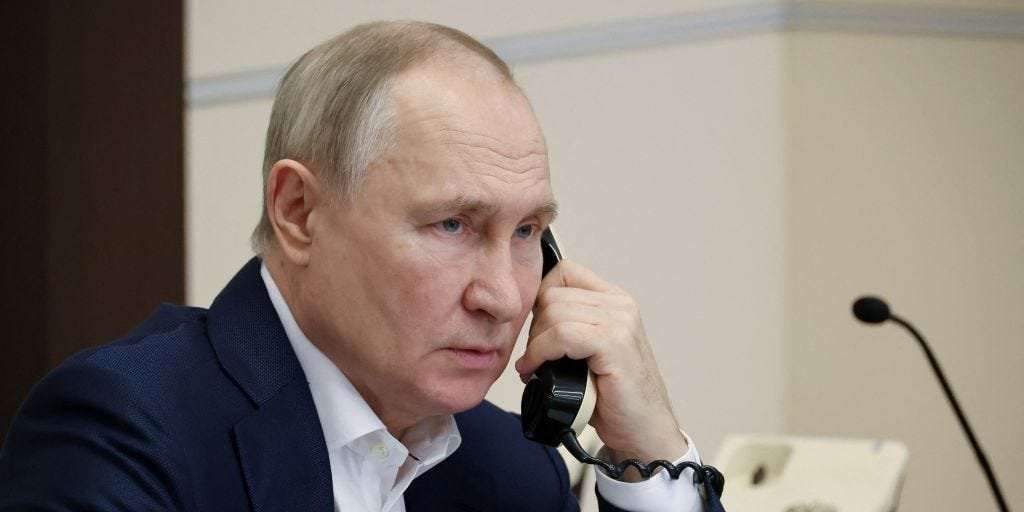 image for Vladimir Putin was never the Soviet super spy he'd like us to believe. He was merely a KGB 'errand boy,' report says