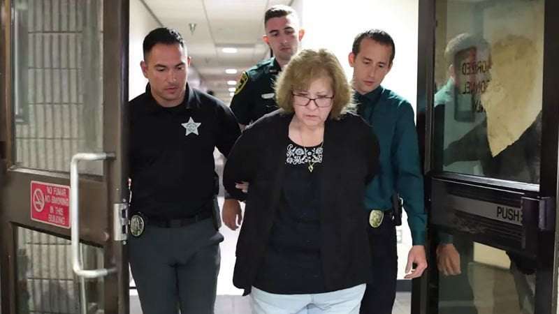 image for Florida woman who fatally shot a Black neighbor hurled racial slurs at victim's children, affidavit says
