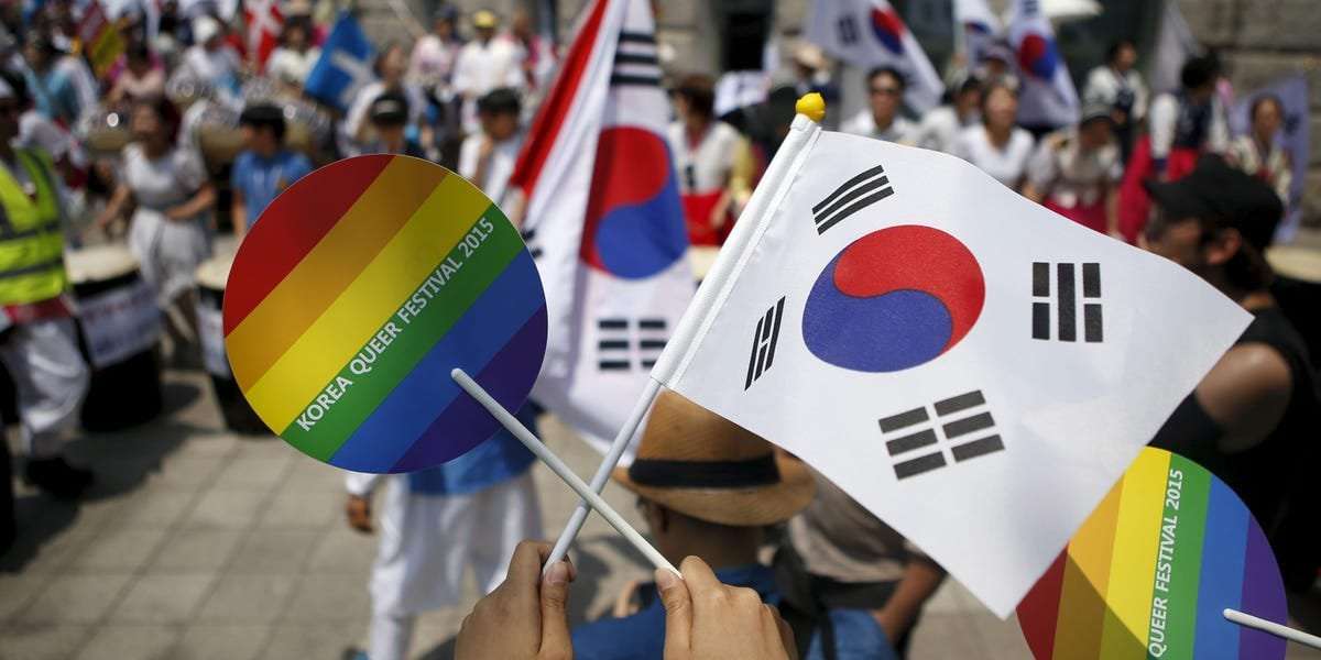 image for A South Korean mayor led hundreds of city officials to stop an annual pride festival but police intervened to protect organizers and allow the event to proceed
