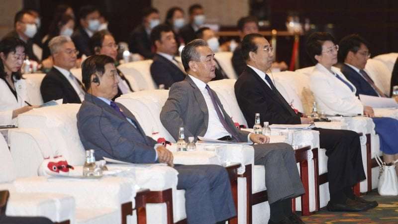 image for China's top diplomat urges Japan and South Korea to align with Beijing and 'revitalize Asia'
