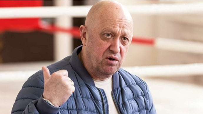 image for Prigozhin arrives in St Petersburg, takes back seized weapons