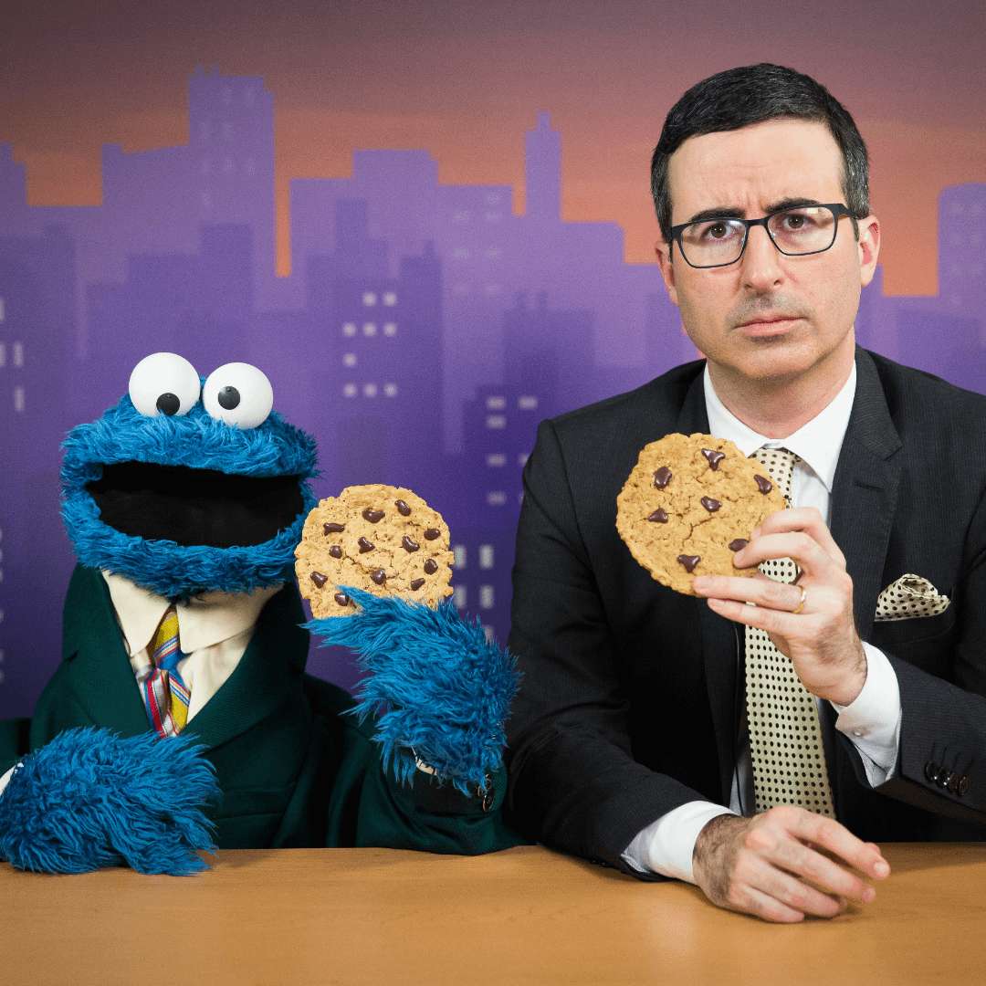 image showing John Oliver and I have 14,000 cookies to share with everyone... Reply for some empty calories.