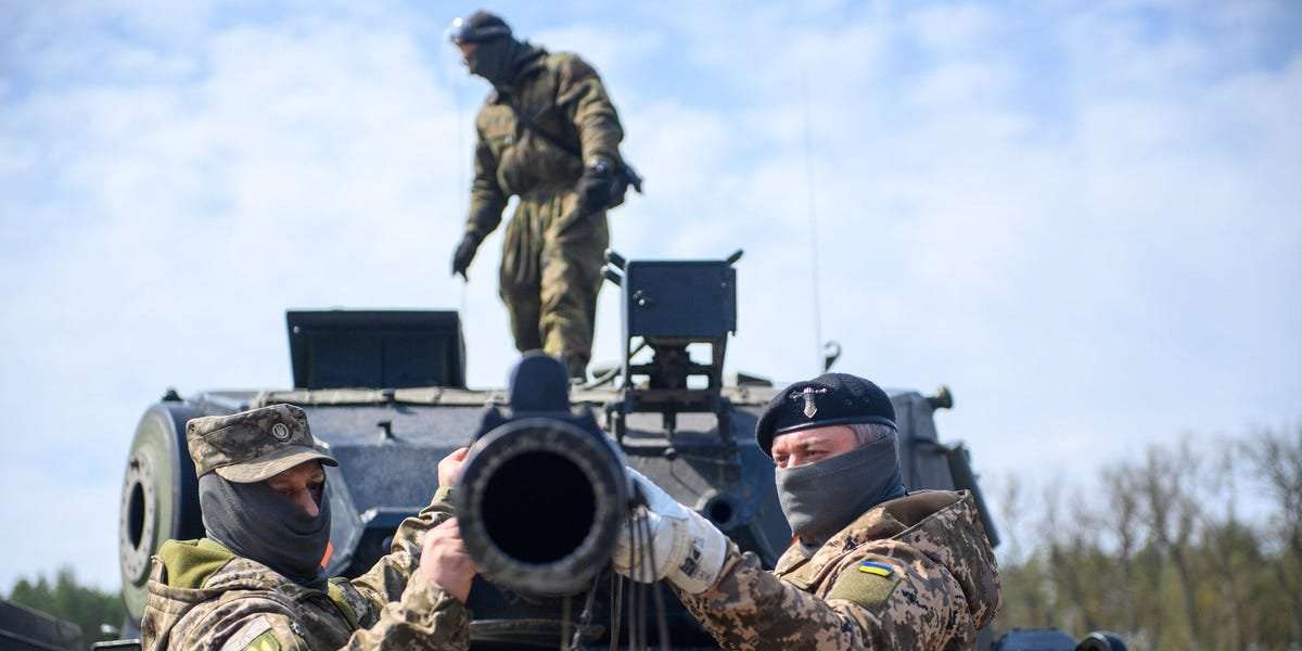 image for Ukrainian units are leaving behind their Western tanks and advancing slowly on foot after coming up against dense Russian minefields, report says