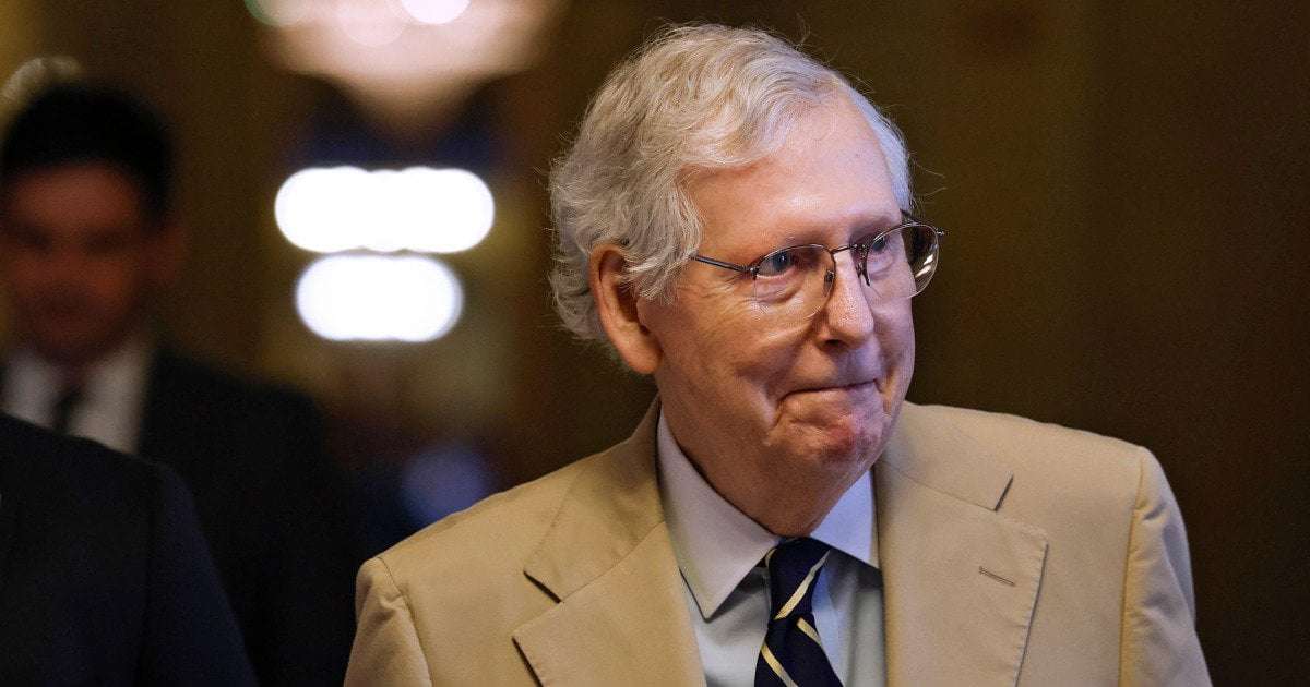 image for Mitch McConnell escorted away from cameras after freezing during a news conference