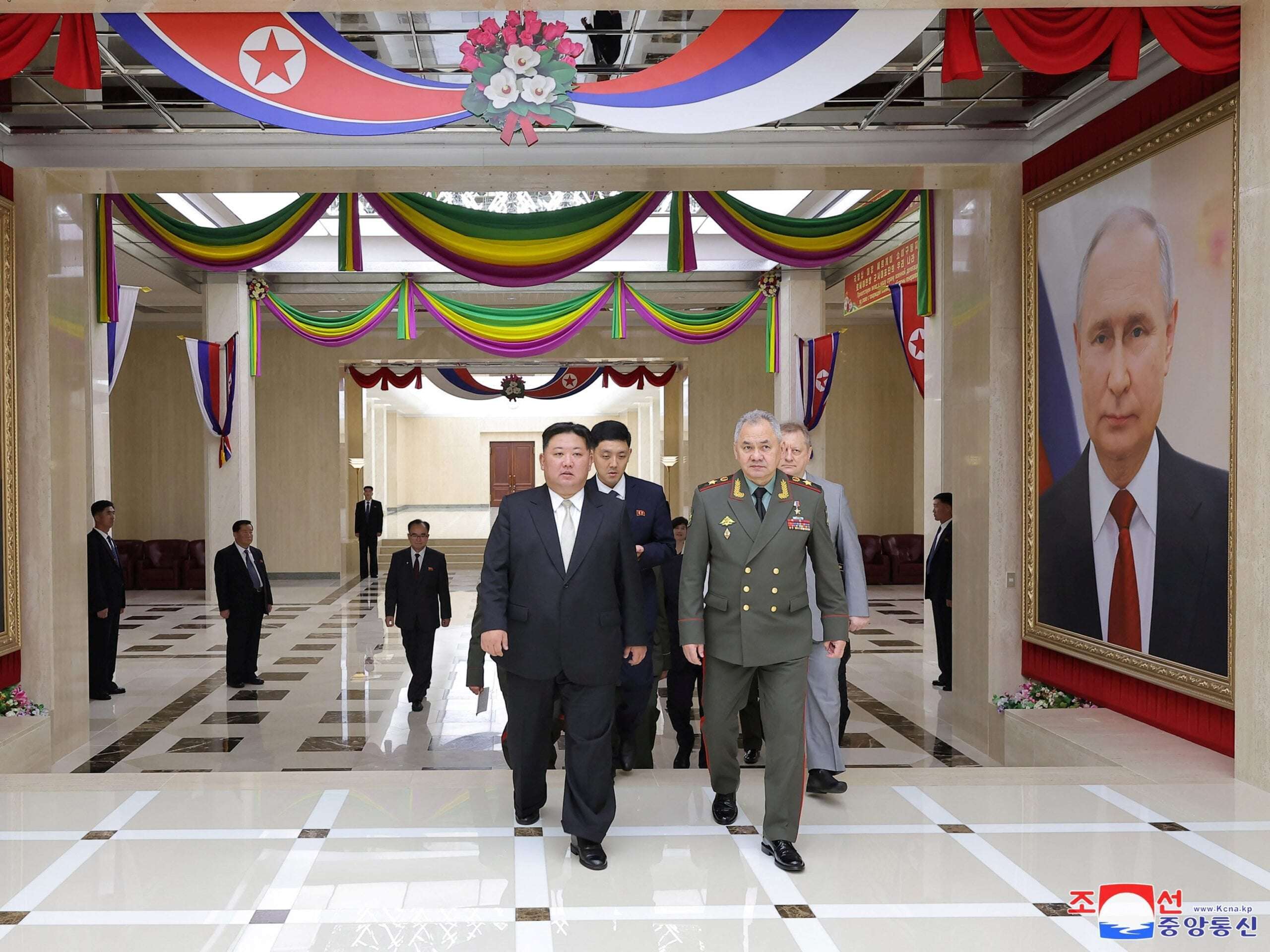 image for Kim Jong Un has plastered his walls with bizarre, giant portraits of Putin, images from North Korean state media reveal