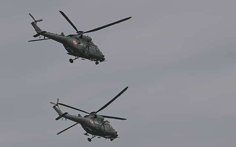 image for Poland deploys attack helicopters to border with Belarus