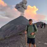 image for A big thank you to the guy who offered to take my picture just as the volcano started erupting!