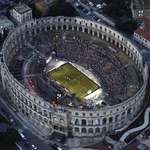 image for A soccer game being played in the 2,000-year-old Pula Arena amphitheater in Croatia