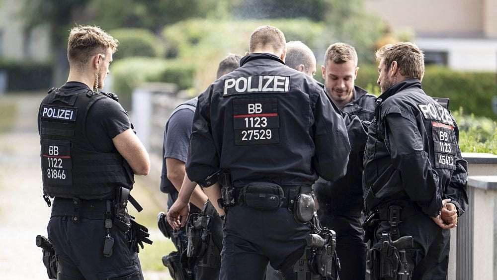 image for Nazi symbols and child pornography found in German police chats