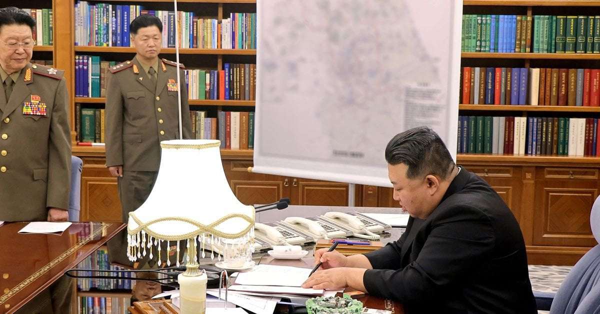 image for North Korea's Kim dismisses top general, calls for war preparations