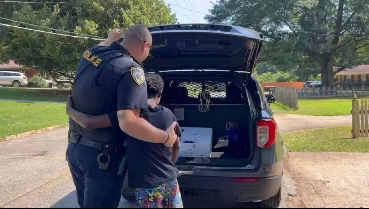 image for Georgia police officer gifts boy PS5 after receiving a call to take him away