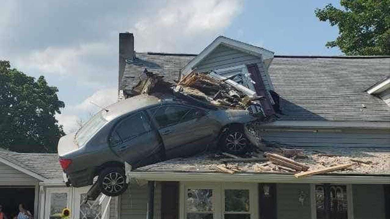 image for Pennsylvania driver hospitalized after bizarrely crashing car into second floor of home