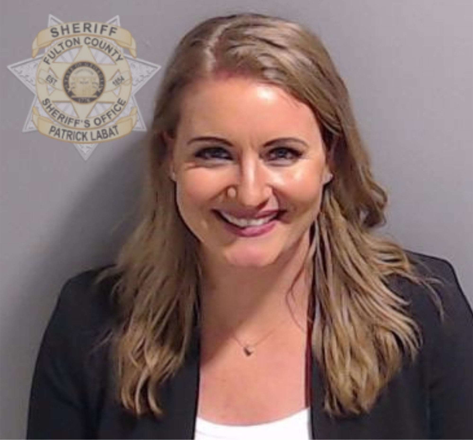 image for Former Trump Lawyer Jenna Ellis Surrenders for Arrest in Fulton County