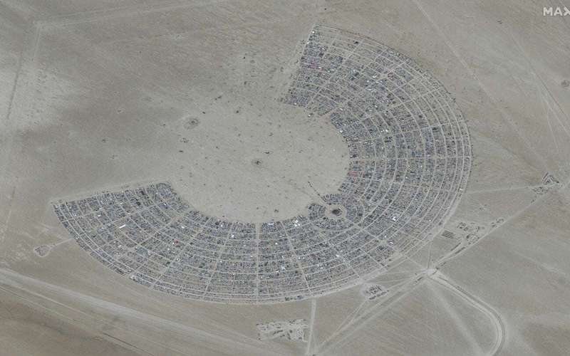 image for Burning Man flooding strands tens of thousands at Nevada site; authorities are investigating 1 death