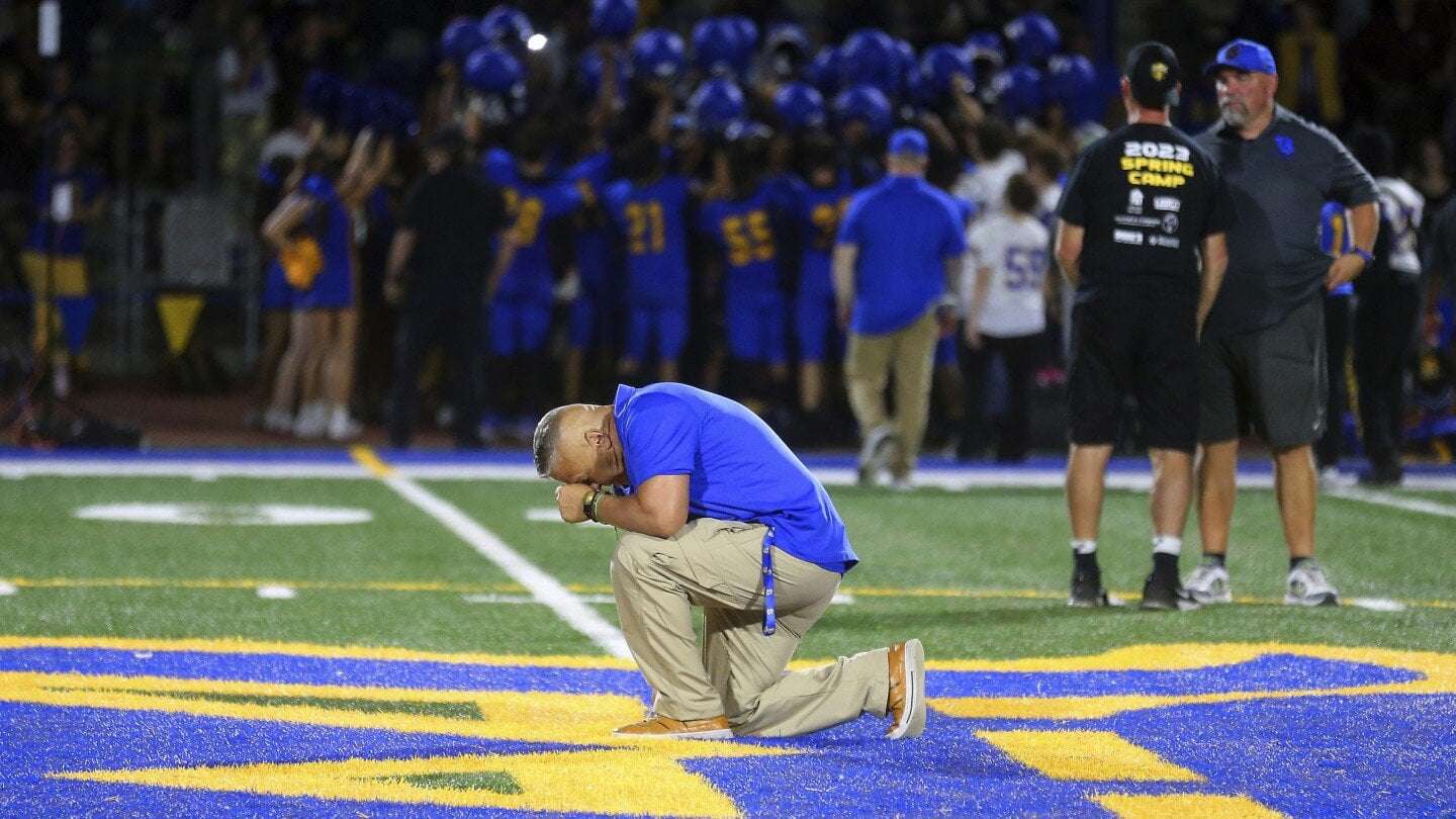 image for A football coach who got job back after Supreme Court ruled he could pray on the field has resigned