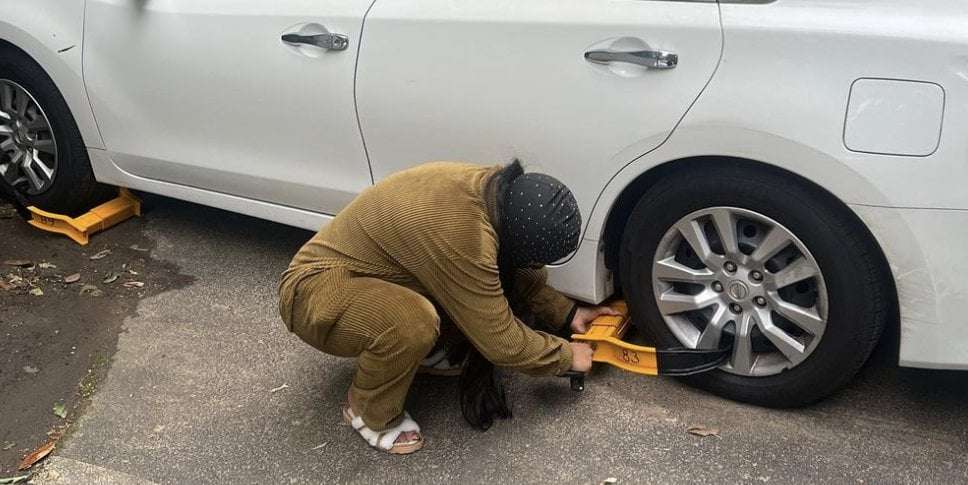 image for Masked 'Boot Girls' Are Freeing Booted Cars All Over Atlanta