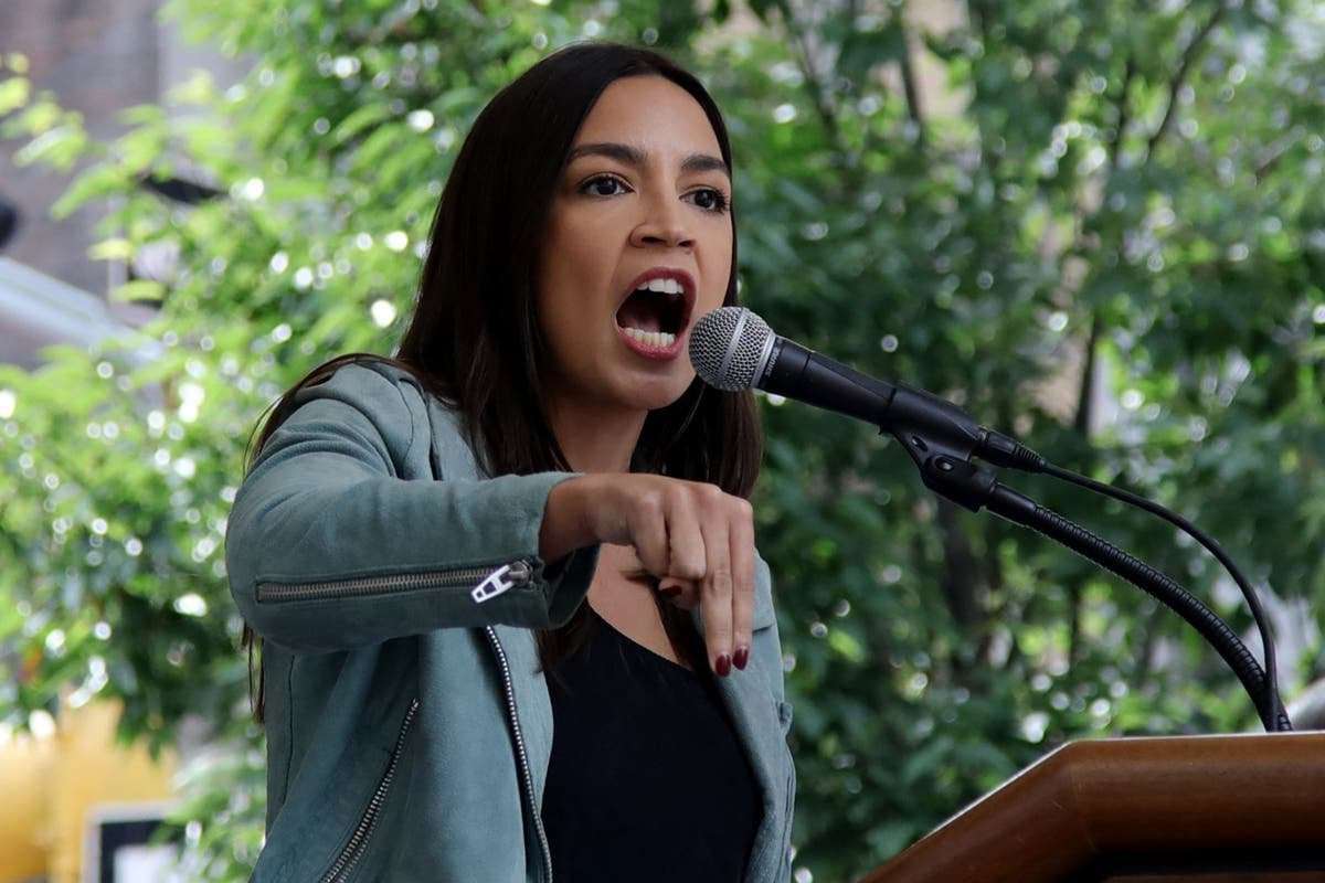 image for AOC slams Marjorie Taylor Greene over her dress code complaint