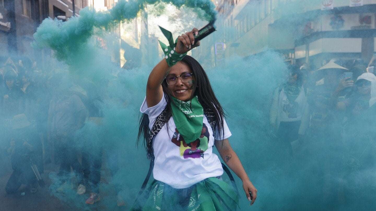 image for Thousands of women march in Latin American cities calling for abortion rights