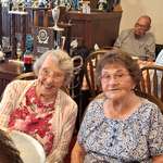 image for My grandmother (right) aged 99 with her best friend (left) aged 98 attending a pizza party.