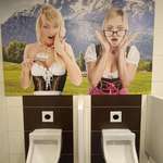 image for This picture above the urinals at a German-themed restaurant