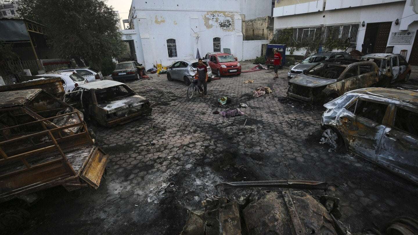 image for AP visual analysis: Rocket from Gaza appeared to go astray, likely caused deadly hospital explosion