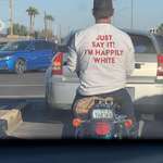 image for I saw this guy in traffic the other day. Look at the shirt and then look at the license plate.