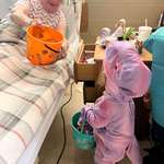 image for Nursing home had trick or treating where kids go room to room to visit residents and get some candy!