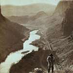 image for A native American man looking over the newly completed transcontinental railroad in Nevada, 1869