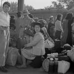 image for Families of Japanese ancestry at a RR station in California awaiting relocation after Pearl Harbor