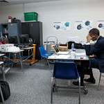 image for Obama sits alone in classroom before speaking at memorial service for victims of Sandy Hook Shooting