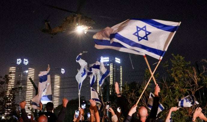 image for Israel-Hamas War: Thirteen Israeli captives, four foreigners freed