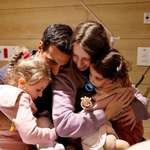 image for Man reunites with his wife and two young daughters, the three were captive by terrorists for 49 days