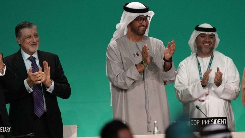 image for COP28: Delegates agree to 'transition away' from planet-warming fossil fuels, slash pollution