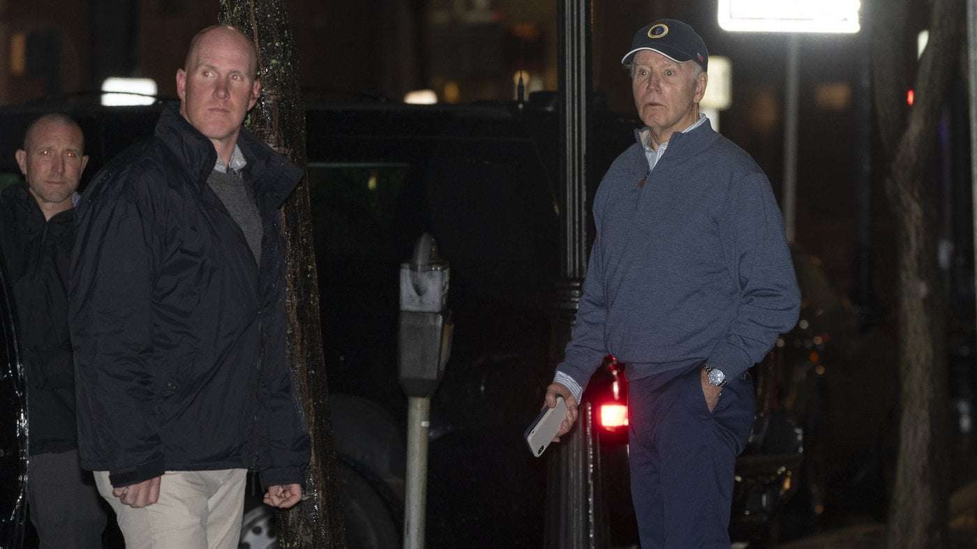 image for Car plows into parked SUV in Biden's motorcade outside Delaware campaign headquarters