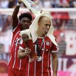 image for Arjen Robben's head is covered with beer