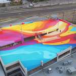 image for Pics of the parking garage mural I painted. This took a lot of gallons LOL!