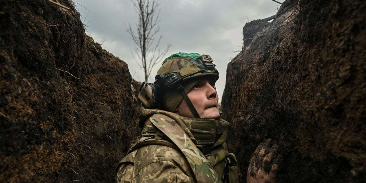 image for Ukrainian soldiers say Russian drones are dropping tear gas on the front lines, choking troops and starting fires in the trenches