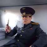 image for North Korean train conductor's reaction as he tries an e-cigarette for the very first time