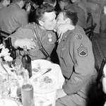 image for End of WW2. Russian soldier giving a “socialist kiss” to a US soldier during the celebration