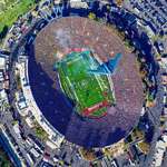 image for A B-2 stealth plane flying over Rose Bowl Stadium for the Alabama/Michigan college football game