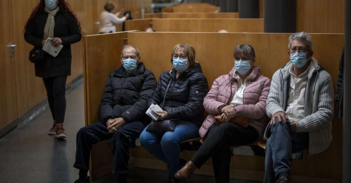 image for Spain makes masks mandatory in hospitals after spike in Covid and flu cases