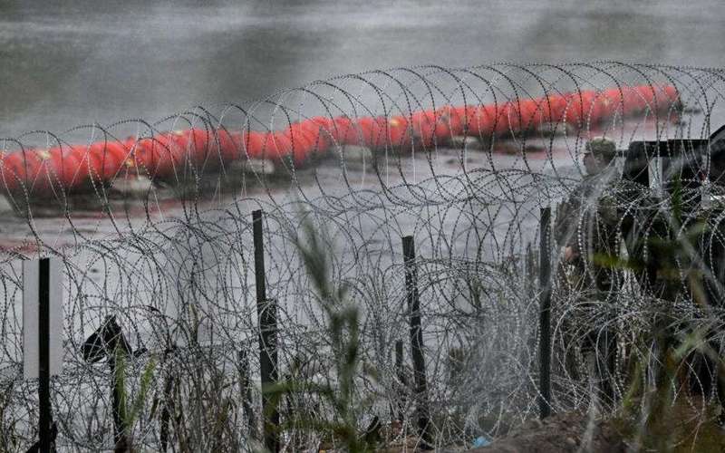 image for Texas "physically barred" Border Patrol agents from trying to rescue migrants who drowned, federal officials say