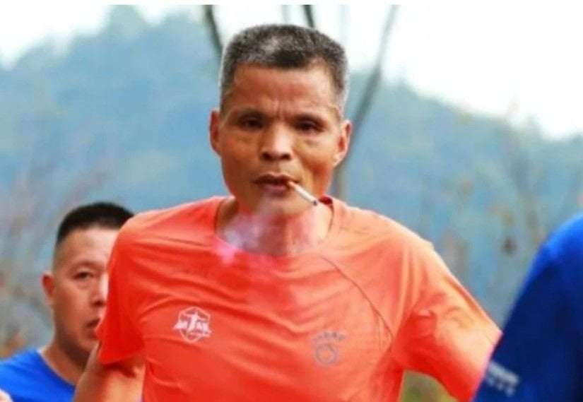 image for Chinese marathon runner disqualified for chain-smoking through entire race