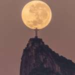 image for Leonardo Sens captures Christ the Redeemer holding the moon. After 3 yearsof planning.