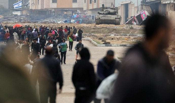 image for Gazans call for Hamas overthrow, flee through IDF humanitarian corridor