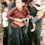 image for kid closes her moms blouse after sexually assaulted by American Gl's. My Lai Massacre 16 March 1968.